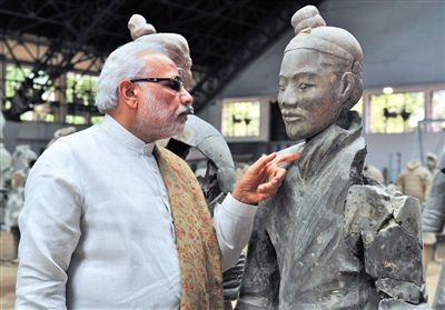 Mr. Modi is expressing great interest in the Terracotta Warriors.
